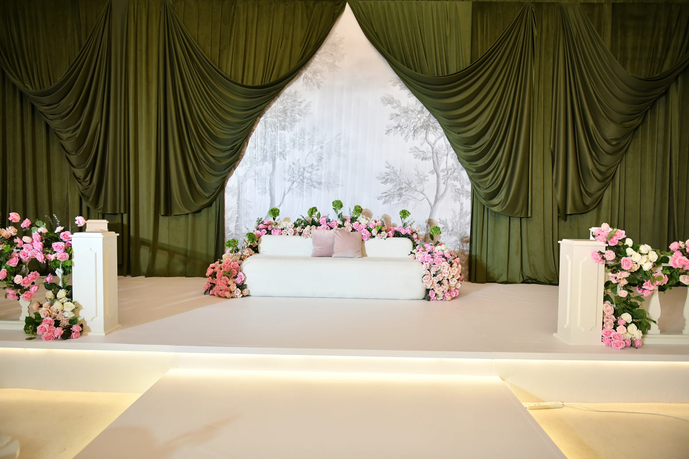 Wedding planners in qatar stage backdrop and lighting in Doha